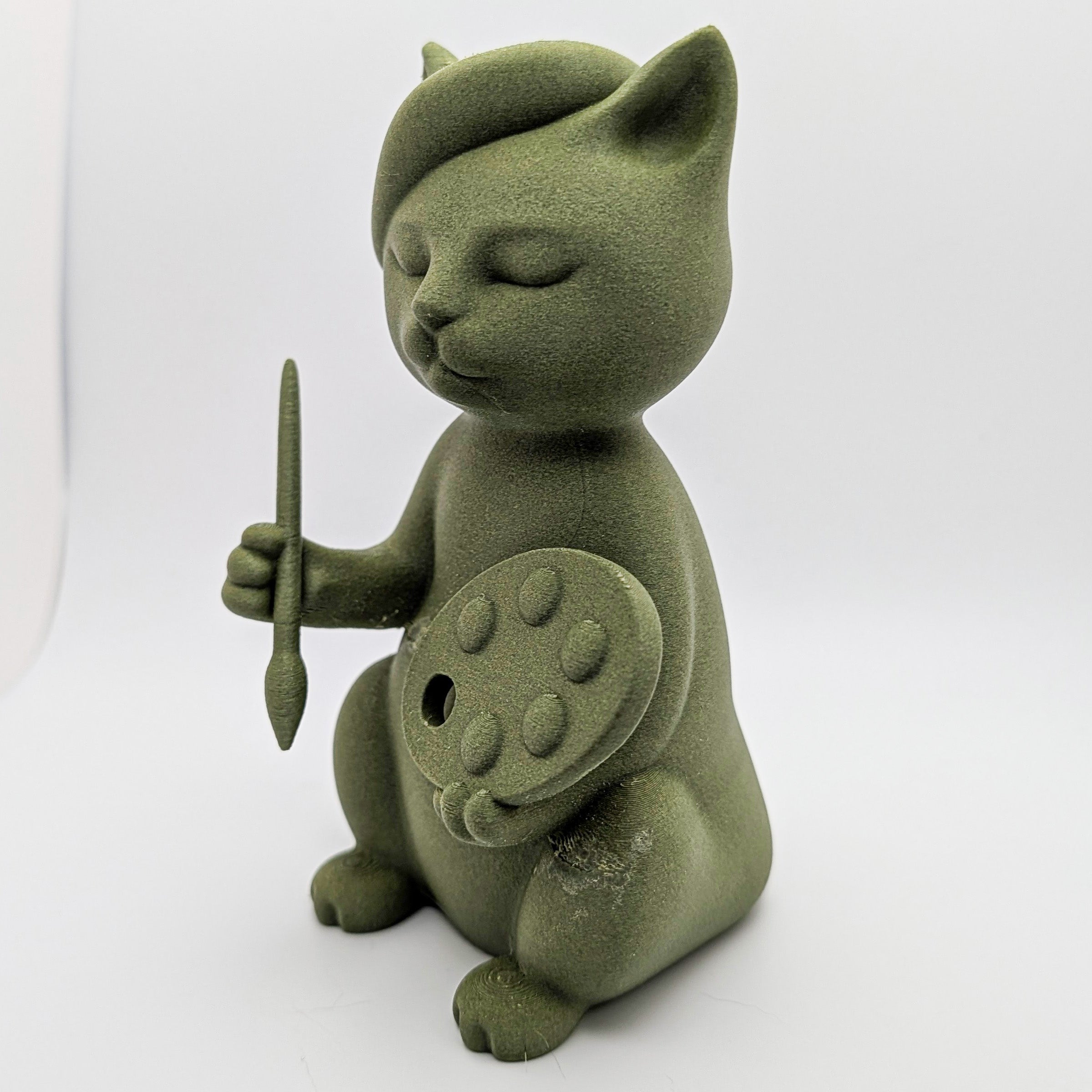Artist Cat Sculpture
